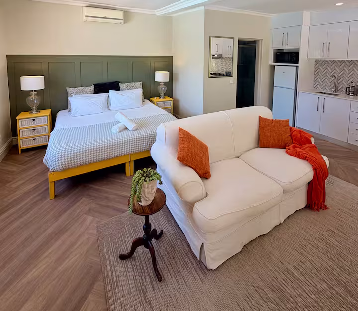Spacious bedroom with comfortable bed at Newlands Cottage, boutique accommodation in Newlands, Cape Town.
